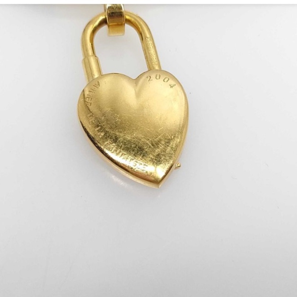 Hermès “Vive L’Idée” heart-shaped cadena padlock on brown leather cord choker - Picture 5 of 6